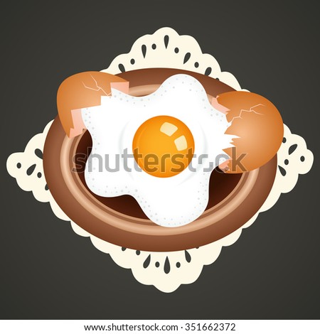 Fried egg on dish background