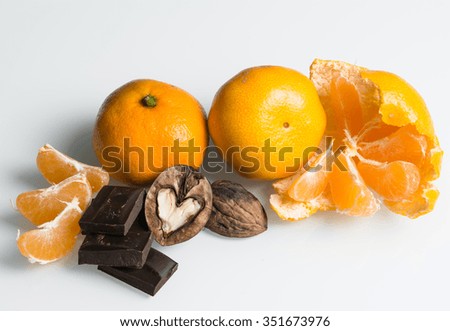 nuts in the shape of a heart with citrus