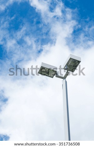 Double street light lamp and blue sky background