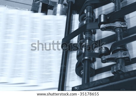 The printed machine does the newspaper