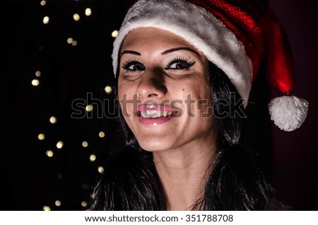 christmas,smiling woman in santa helper hat