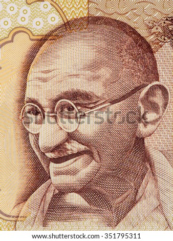 Mahatma Gandhi portrait on indian 500 rupee banknote macro, India money closeup Royalty-Free Stock Photo #351795311