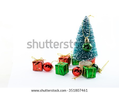Christmas tree and gifts on white background