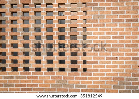 orange brick wall background pattern with hole block