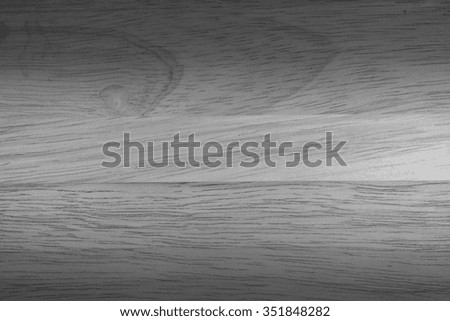 Texture of wood background closeup in black and white.