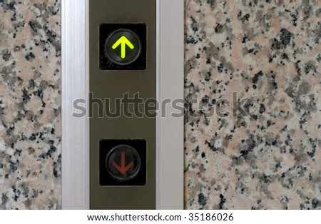 It is the elevator button of up sign.
