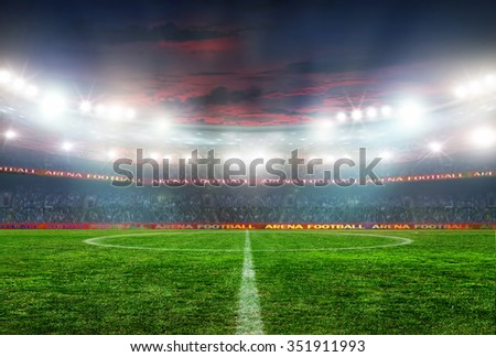 Soccer ball on the field of stadium with light  Royalty-Free Stock Photo #351911993