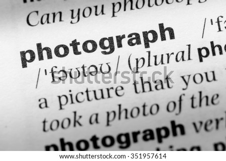 Close up of English dictionary page with word photography