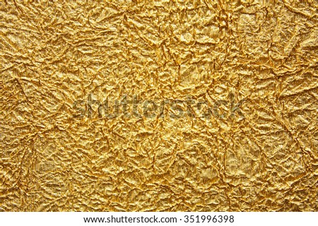 Shiny gold texture crumpled background
