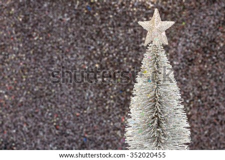 Snow christmas tree on glitter black background 
