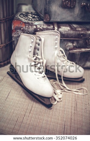 Christmas and New Year decorated background. Vintage Ice Skates