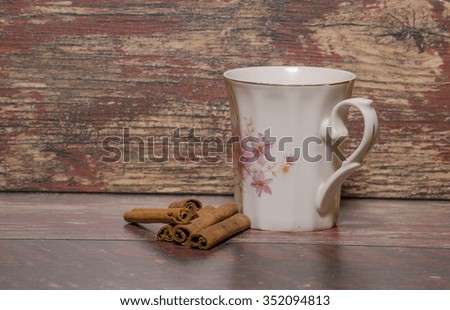 Cup of tea with cinnamon sticks