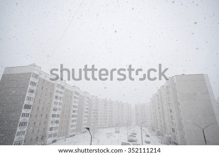 snow falling blizzard rooftops christmas winter background