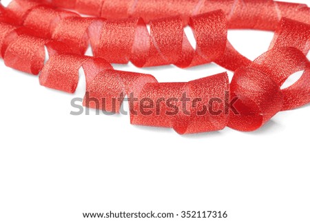 Red ribbon of twisted spiral on a white background.