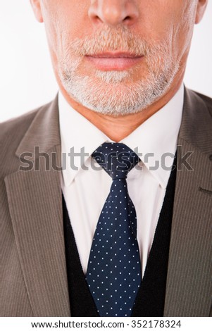 Closeup photo of old  businessman in an elegant business suit with beard