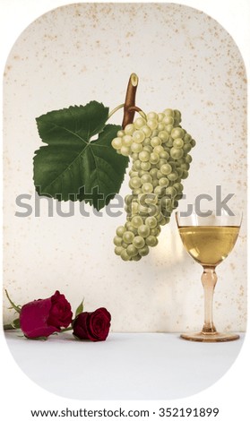 ancient glass of white wine background grape cluster decorated, romantic moment with flowers rose ,cutout photo,  natural light, vertical photo