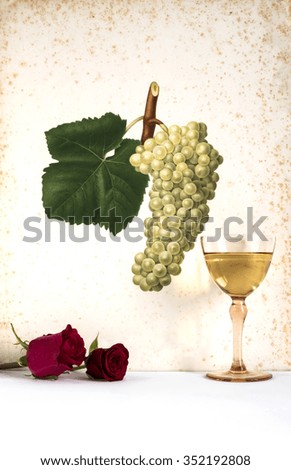 white wine in a glass with rose and bunch of grapes, romantic moment with flowers rose , natural light, vertical photo