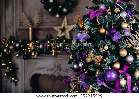 Christmas decorations on the branches fir,Decorated Christmas tree on blurred, sparkling and fairy background Royalty-Free Stock Photo #352215599