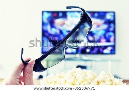3D glasses against TV-set