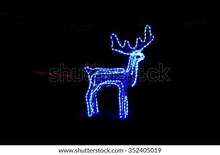  Christmas scene with illuminated tree outdoor