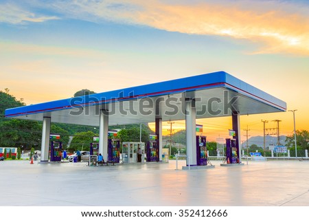 Gas station at sunset. Royalty-Free Stock Photo #352412666