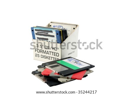 old floppy disc in a box isolated on white room for your text