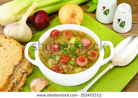 Healthy and Diet Food: Soup with Lentils, Celery and Sausage. Studio Photo