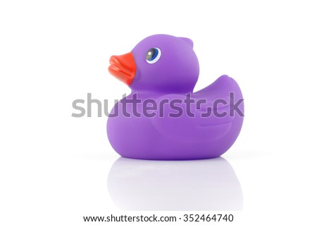 Purple rubber bath duck isolated on the white background Royalty-Free Stock Photo #352464740