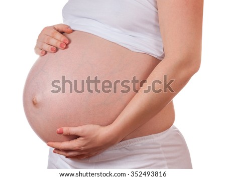 Pregnant Woman Belly. Pregnancy Concept. Isolated on a White Background