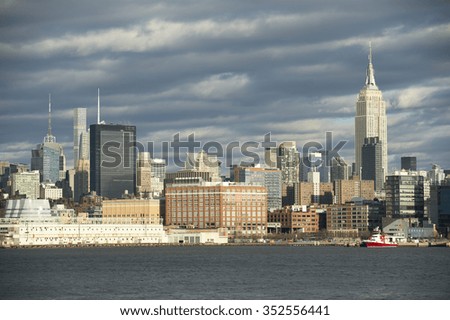 Scenic landscape view of the Midtown Manhattan skyline of New York City from the Hudson River on the New Jersey side