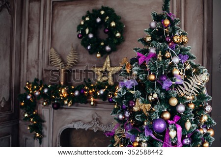 Christmas decorations on the branches fir,Decorated Christmas tree on blurred, sparkling and fairy background Royalty-Free Stock Photo #352588442