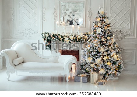 Christmas and New Year decorated interior room with presents and New year tree Royalty-Free Stock Photo #352588460