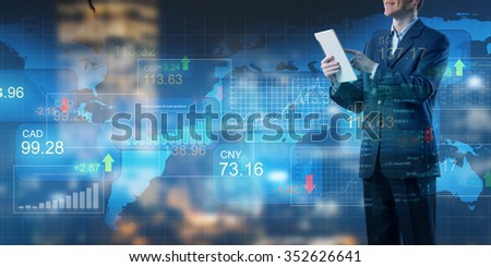 Businessman on digital background using tablet finances application