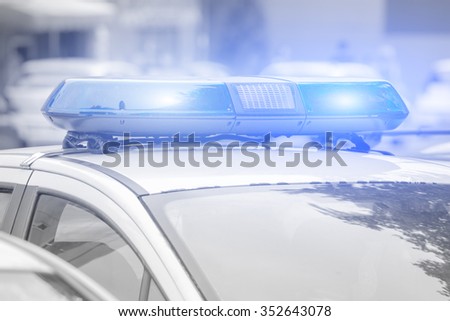 Police car with lights turned on. Royalty-Free Stock Photo #352643078