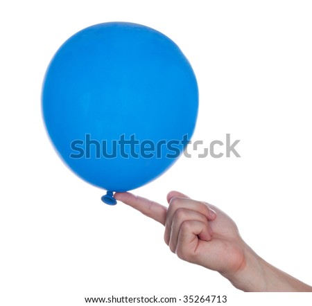Blue color balloon in human hand on fun party