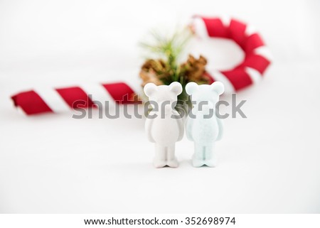 beautiful small plaster bear wishes Merry Christmas. White background