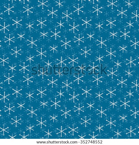 Seamless illustrated pattern made of hand drawn snowflakes on blue