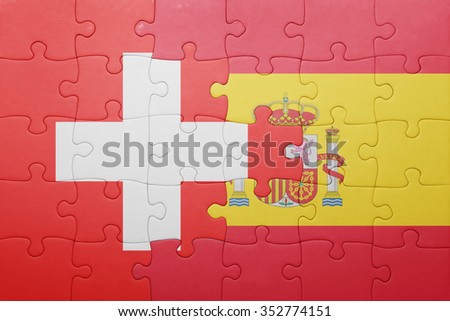 puzzle with the national flag of spain and switzerland . concept