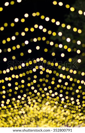 bokeh lights and festive winter gold abstract for background 