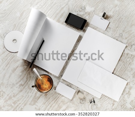 Blank template for design presentations and portfolios. Photo of blank stationery set on wooden background. 