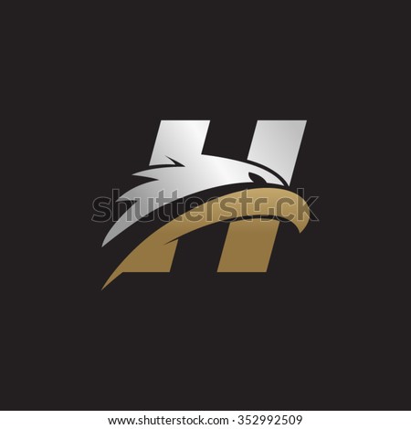 letter H eagle head silver gold logo black background