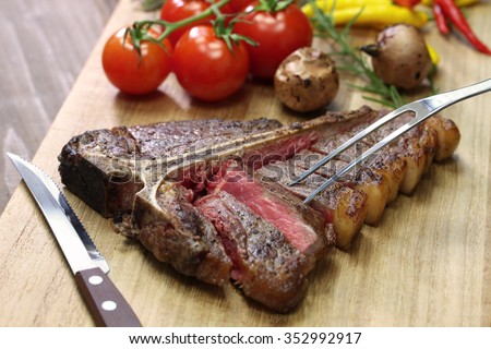t-bone steak,porterhouse steak,bistecca alla fiorentina Royalty-Free Stock Photo #352992917