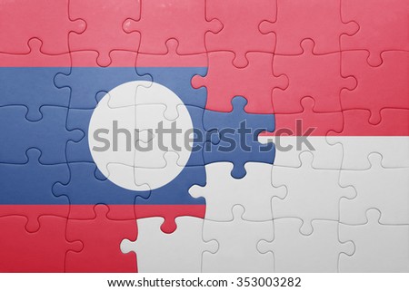 puzzle with the national flag of indonesia and laos . concept