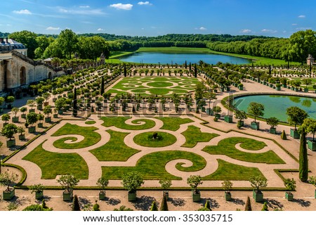 Orangerie Parterre built by Jules Hardouin-Mansart (1684 - 1686) in Versailles palace. Paris, France. It features 1,055 trees, including palm trees, oleanders, pomegranate, eugenias and orange trees. Royalty-Free Stock Photo #353035715
