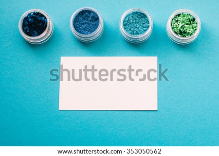 Layout for banner advertising for the makeup artist. Shadows and business card on a bright turquoise background