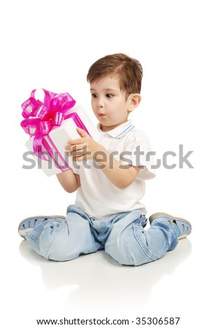 The little boy with a gift in a hands