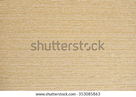 Light brown scratched wooden cutting board. Wood texture.