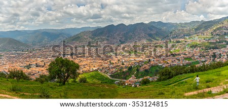 Cityscape of Cusco in Sacred Valley. Panoramic view from a fortress Saksaywaman (UNESCO World Heritage Site) - Peru, South America