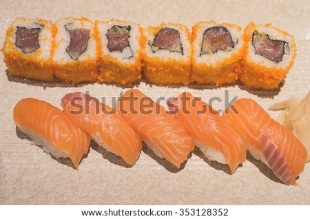 Salmon sushi rolls, japanese food - vintage picture effect