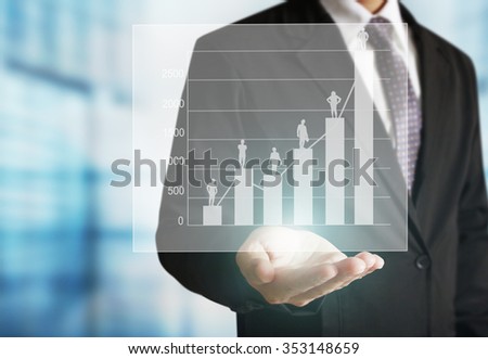 businessman with financial symbols coming from han